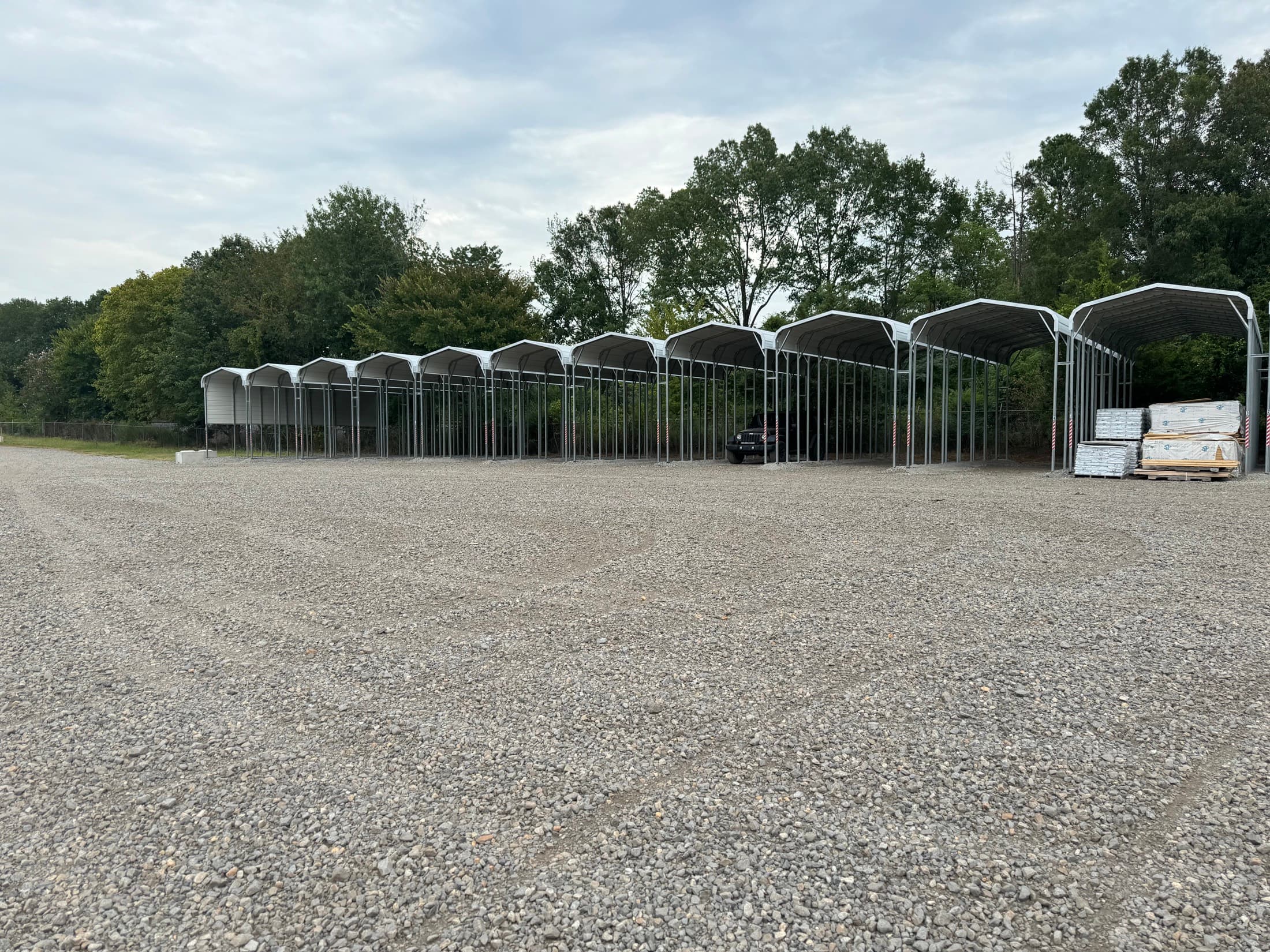 Row of covered parking canopies at MidArk Outside Storage